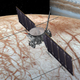 A rendering of the Europa Clipper above its namesake moon.